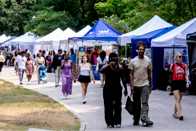Crowd at previous market in Piedmont Park